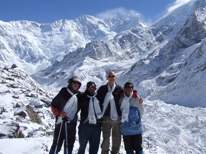 Happy Trekkers in front of Mt Kanchenjunga